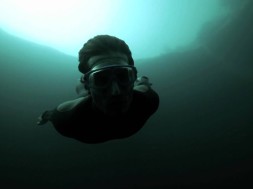 Guillaume Nery base jumping at Dean’s Blue Hole, filmed on breath hold by Julie Gautier