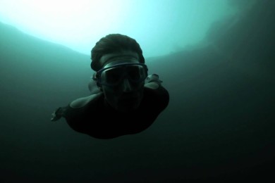 Guillaume Nery base jumping at Dean’s Blue Hole, filmed on breath hold by Julie Gautier